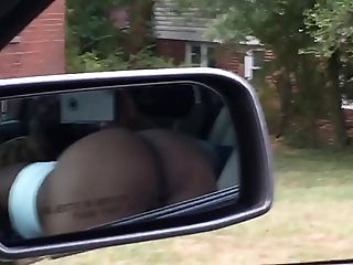 Black thot sucking dick in front seat of car